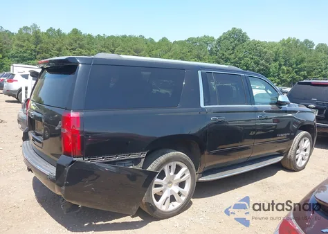 2017 Chevrolet Suburban Premier z USA, uszkodzony, nr VIN 1GNSCJKC0HR269840